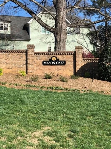 Neighborhood signage gives your entrance a great first impression! We mounted dimensional letters to a custom shaped aluminum backer panel for a classic look.
